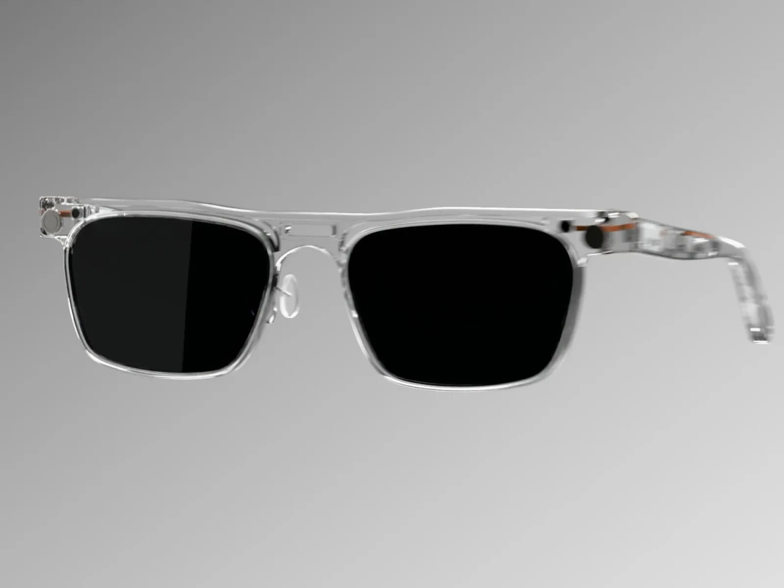 Senro PRO, clear glasses with dark lenses, floating on a grey background.